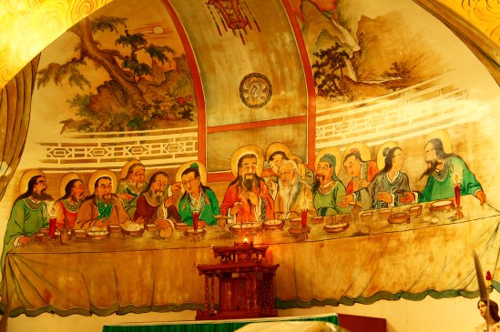 [The fresco here, right above and behind a very Chinese tabernacle, illustrates the Last Supper.]