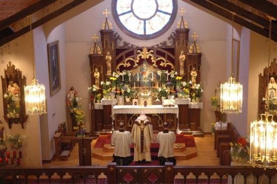 [Notice the Altar Rail along the bottom of the photo.]